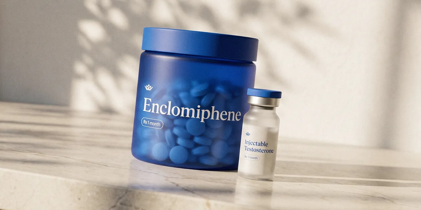 Enclomiphene jar next to an injectable testosterone vial on a marble counter